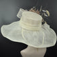 Wide Brim Sinamay Derby Hat: Ivory, Taupe, and Gold Feather Flowers