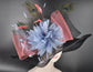 Black Sinamay Kentucky Derby Hat: Blue Coral Feather Flowers